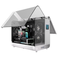 Destello Tormenta white gaming PC with glass panel lifted open, exposing Ryzen 9600X motherboard and RX 9700 XT graphics card