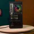 Destello Luz black gaming PC rear view showing back panel I/O ports, cable management and power supply